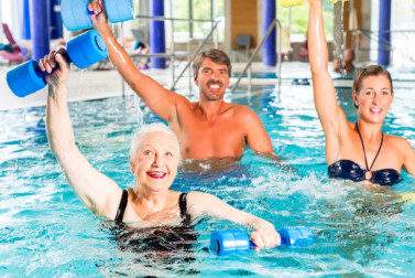 Seniors in aerobic swimming class.