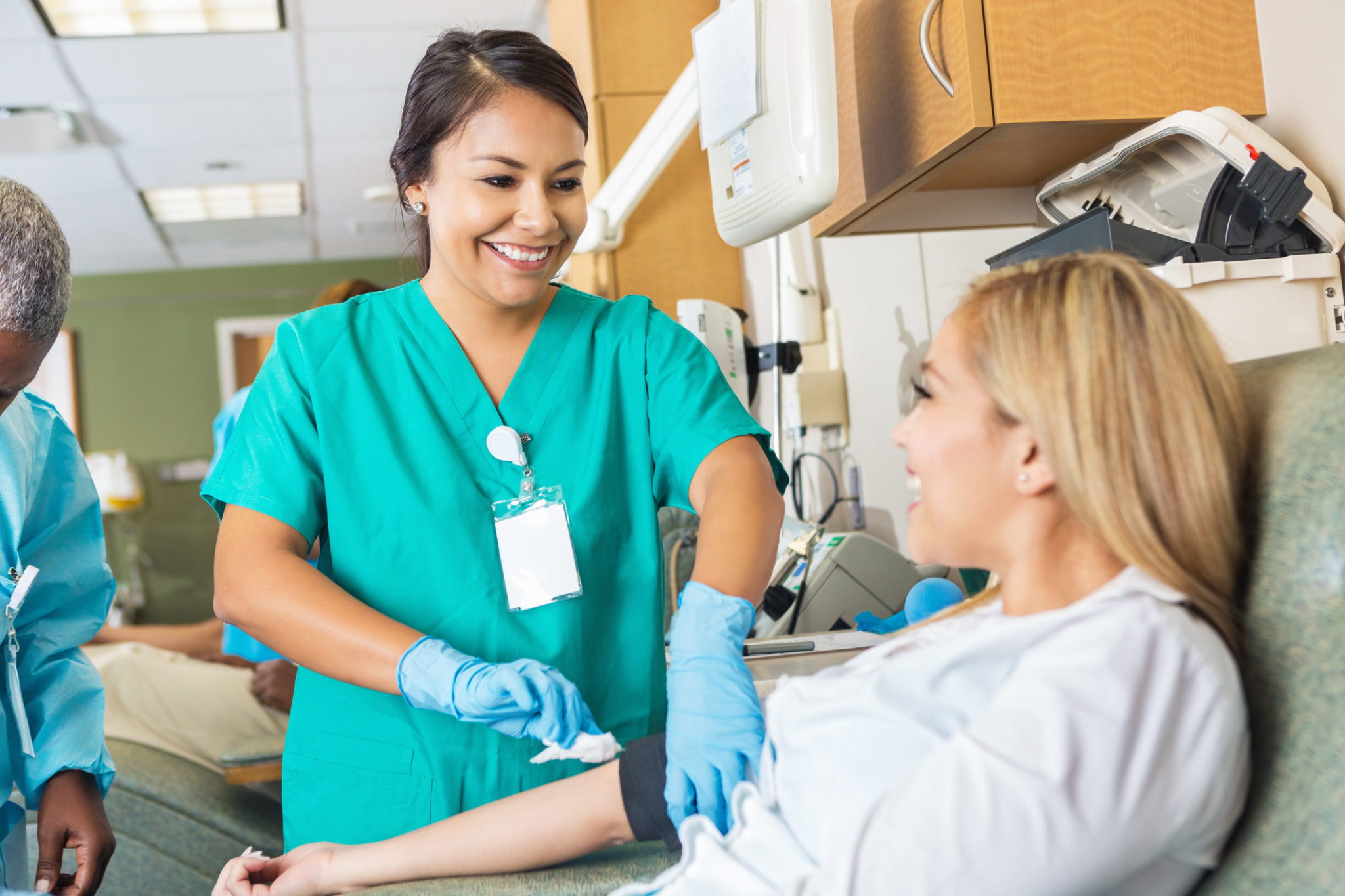 woman giving blood donation