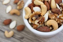 a bowl of nuts with health benefits