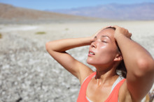 Woman in the sun risking dehydration