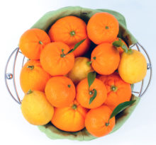 A basket of oranges with vitamin c benefits