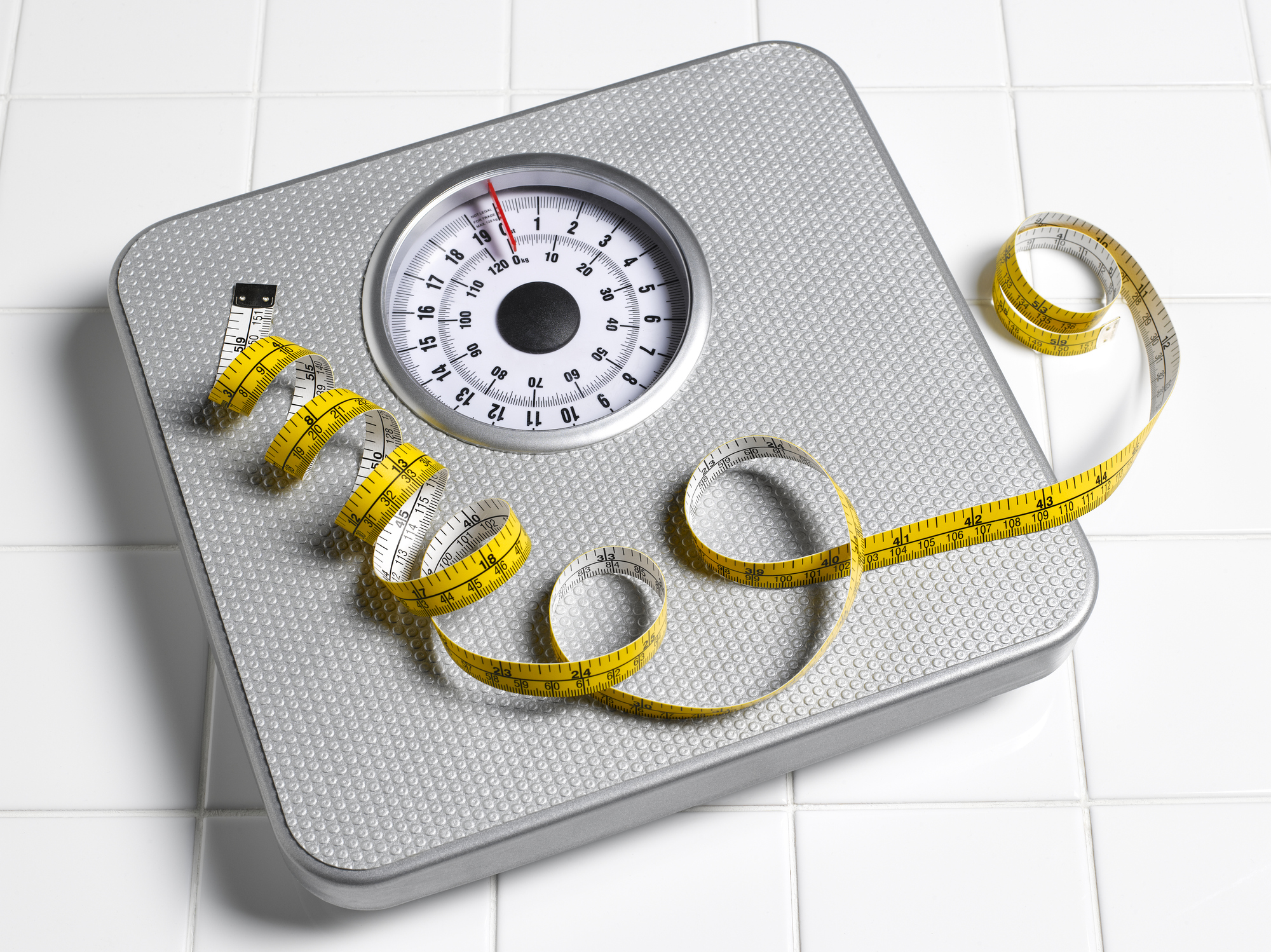 yo-yo dieting scale with tape measure